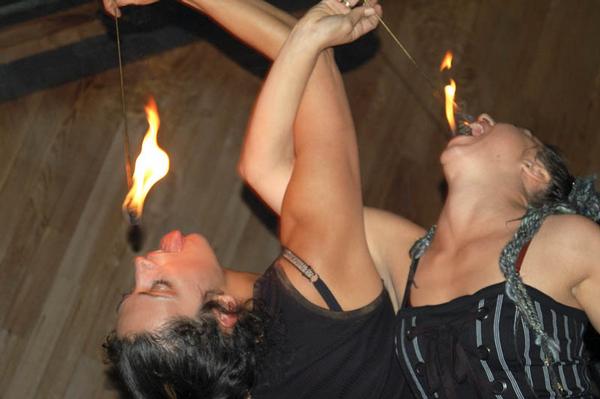 From Big Sur to Paris, a local woman’s fire dancing burns green.